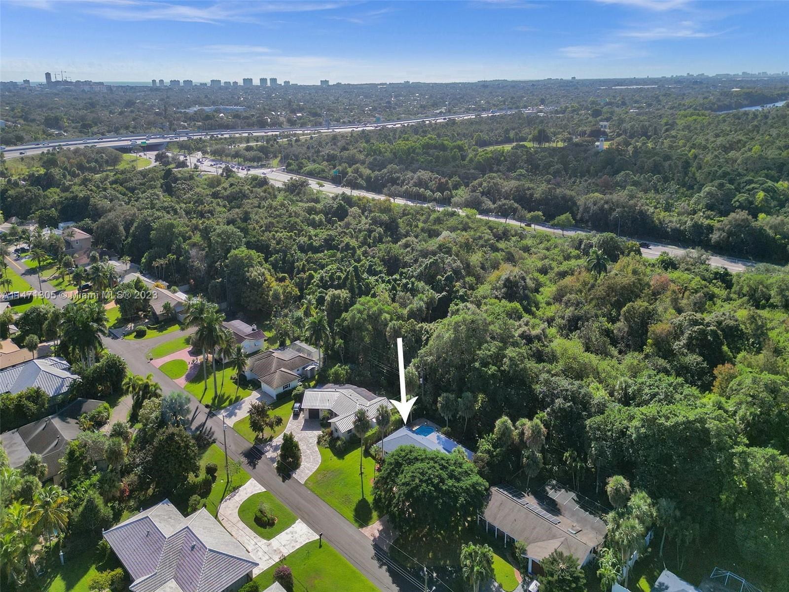 2028 South Conference Drive Boca Raton, FL 33486 - Photo 56 of 62 an aerial view of multiple house with a yard