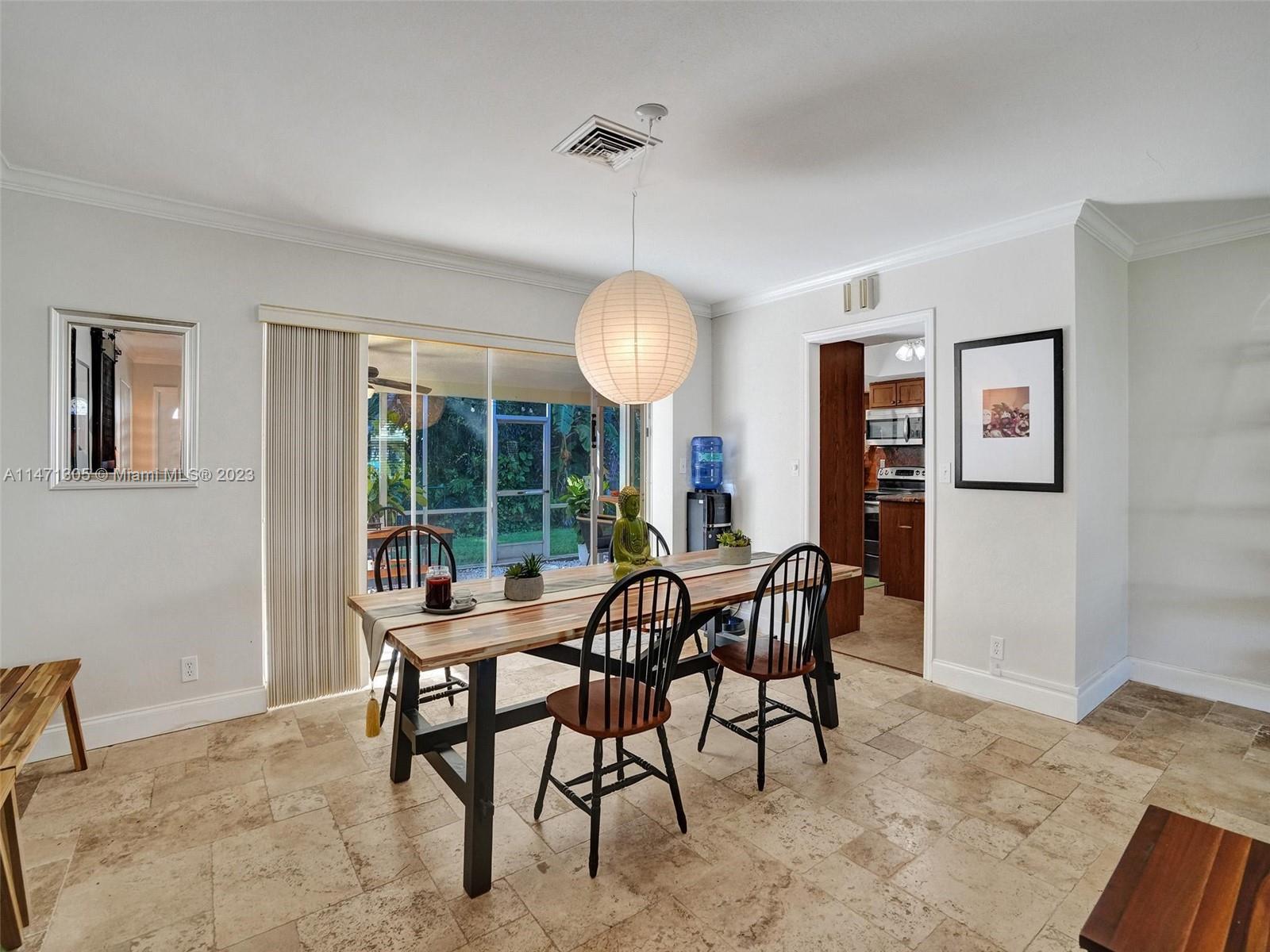 2028 South Conference Drive Boca Raton, FL 33486 - Photo 6 of 62 a view of a dining room with furniture window and outside view
