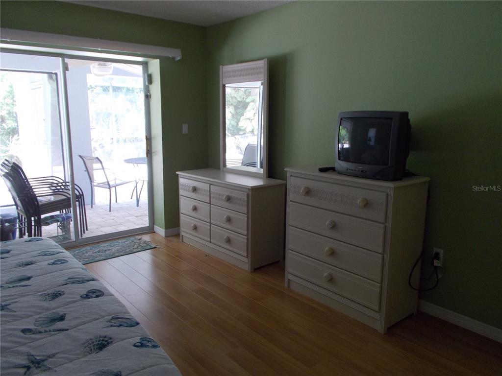 2880 Geneva Road Venice, FL 34293 - Photo 11 of 19 a room with hard wood floors and a window