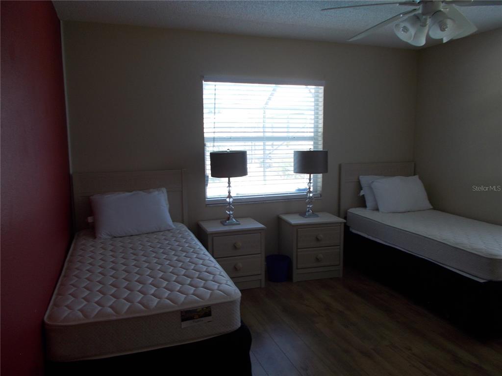 2880 Geneva Road Venice, FL 34293 - Photo 12 of 19 a bedroom with a bed and a window