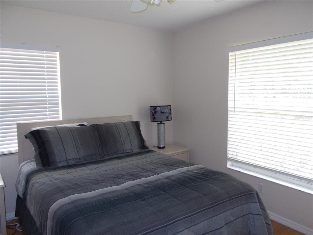 2880 Geneva Road Venice, FL 34293 - Photo 15 of 19 a bedroom with a bed and window