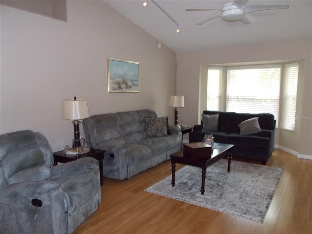 2880 Geneva Road Venice, FL 34293 - Photo 3 of 19 a living room with furniture and a window