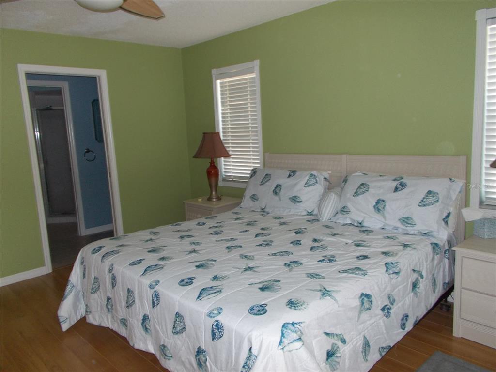 2880 Geneva Road Venice, FL 34293 - Photo 8 of 19 a bedroom with a bed and a window