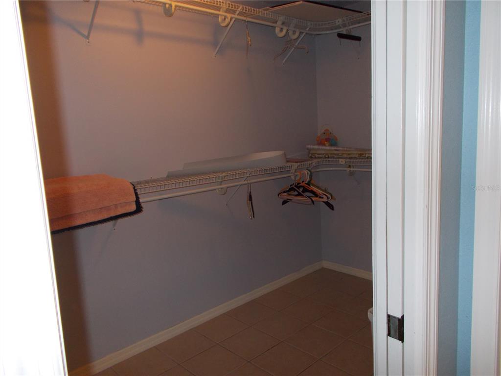 2880 Geneva Road Venice, FL 34293 - Photo 9 of 19 a view of a room with racks on the wall