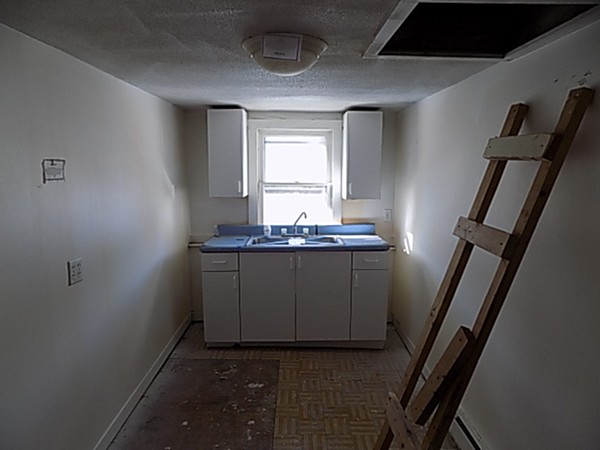 13 Basket Street Huntington, MA 01050 - Photo 13 of 18 a bathroom with sink and mirror
