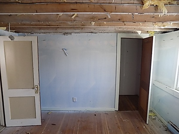 13 Basket Street Huntington, MA 01050 - Photo 16 of 18 a view of storage and utility room with wooden floor