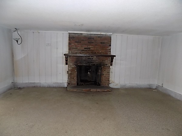 13 Basket Street Huntington, MA 01050 - Photo 18 of 18 a view of empty room with fireplace