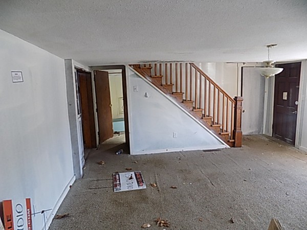 13 Basket Street Huntington, MA 01050 - Photo 9 of 18 a view of a hallway with stairs