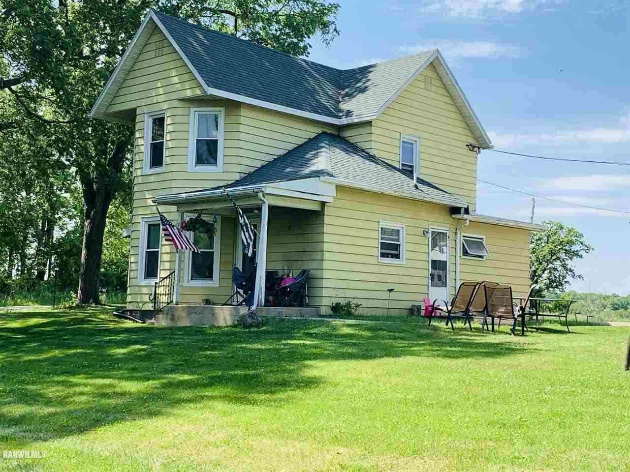 2985 North AYP Road Lena, IL 61048 - Photo 1 of 5 a front view of house with yard and green space