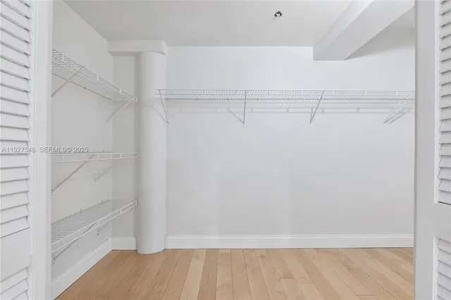 a view of a room with racks on the wall