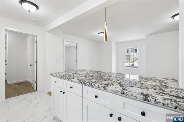 a view of kitchen counter space and window