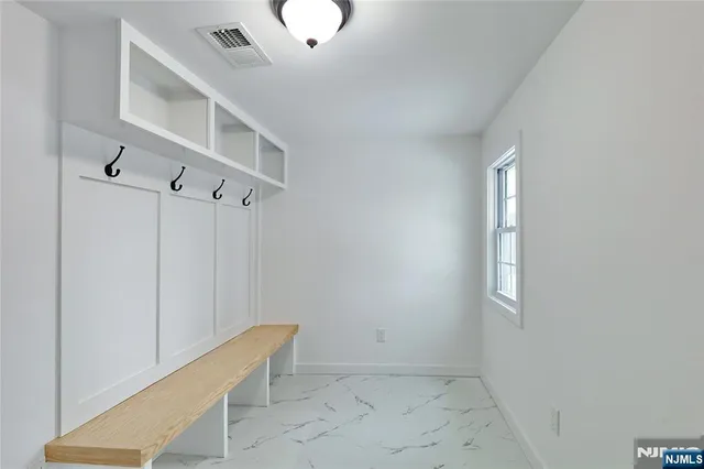 a view of room with air conditioner and window