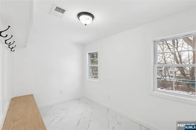 an empty room with windows