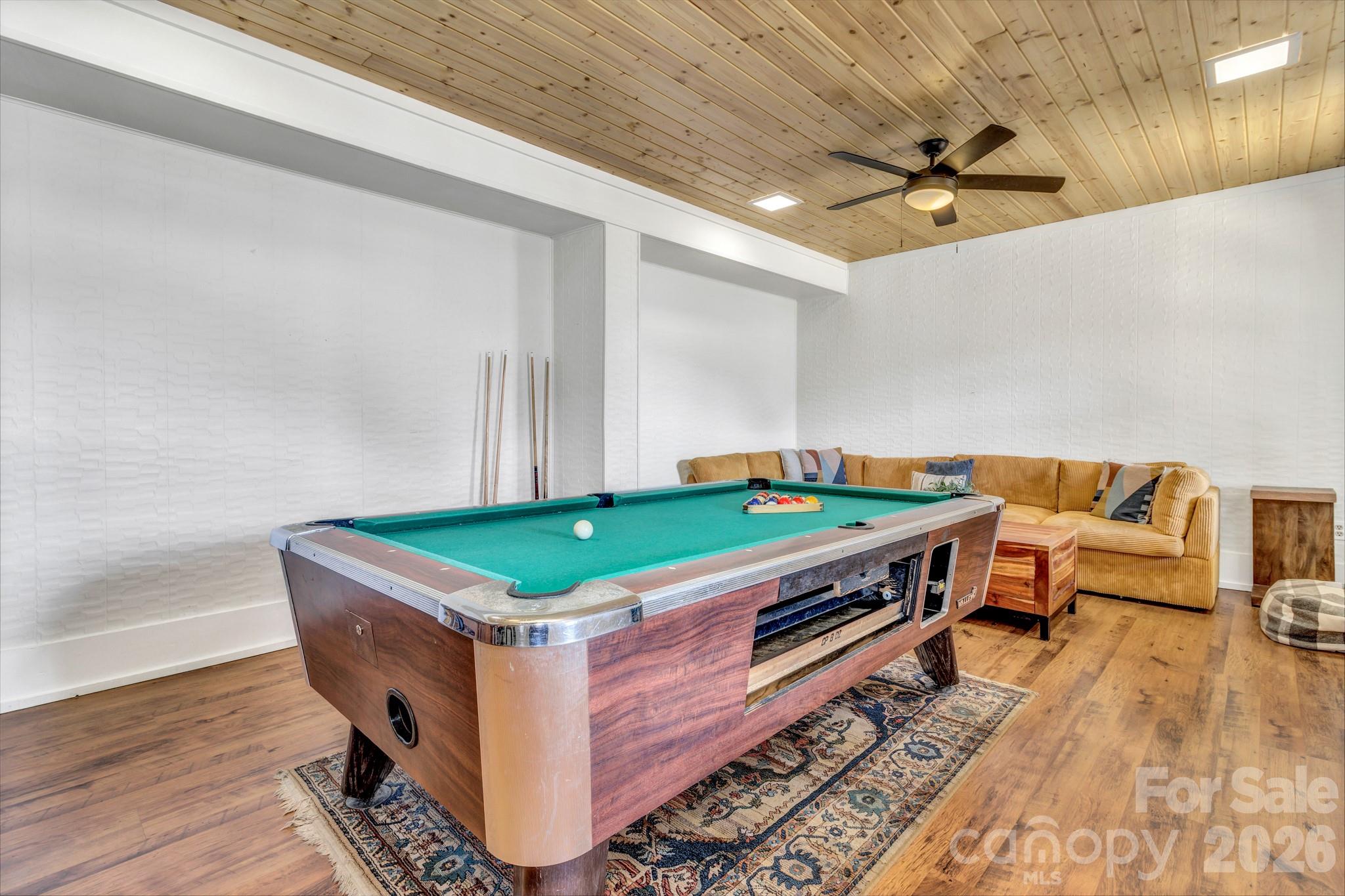 80 Hidden Falls Road Maggie Valley, NC 28751 - Photo 12 of 47 a room with pool table and a wooden floor