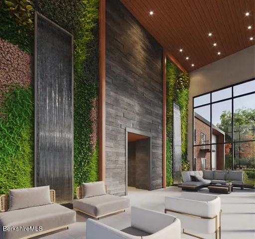 a building outdoor space with patio furniture and potted plants