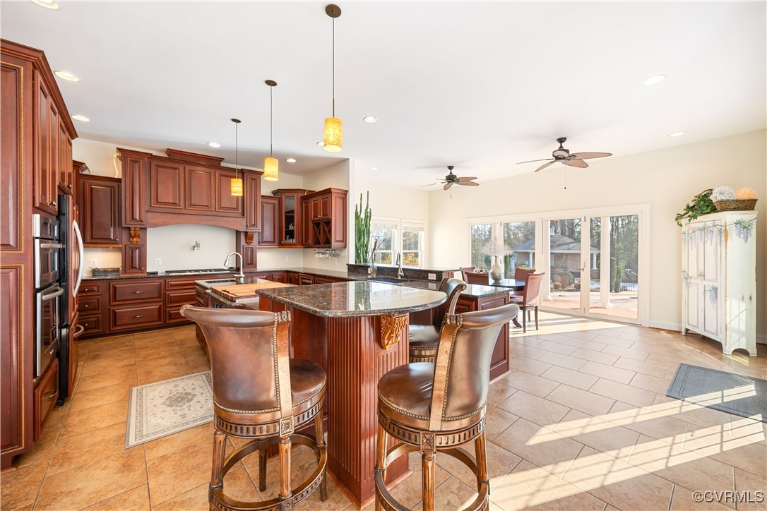 18185 Narrow Path Trail Doswell, VA 23047 - Photo 15 of 48 a view of a dining room with furniture water and chandelier