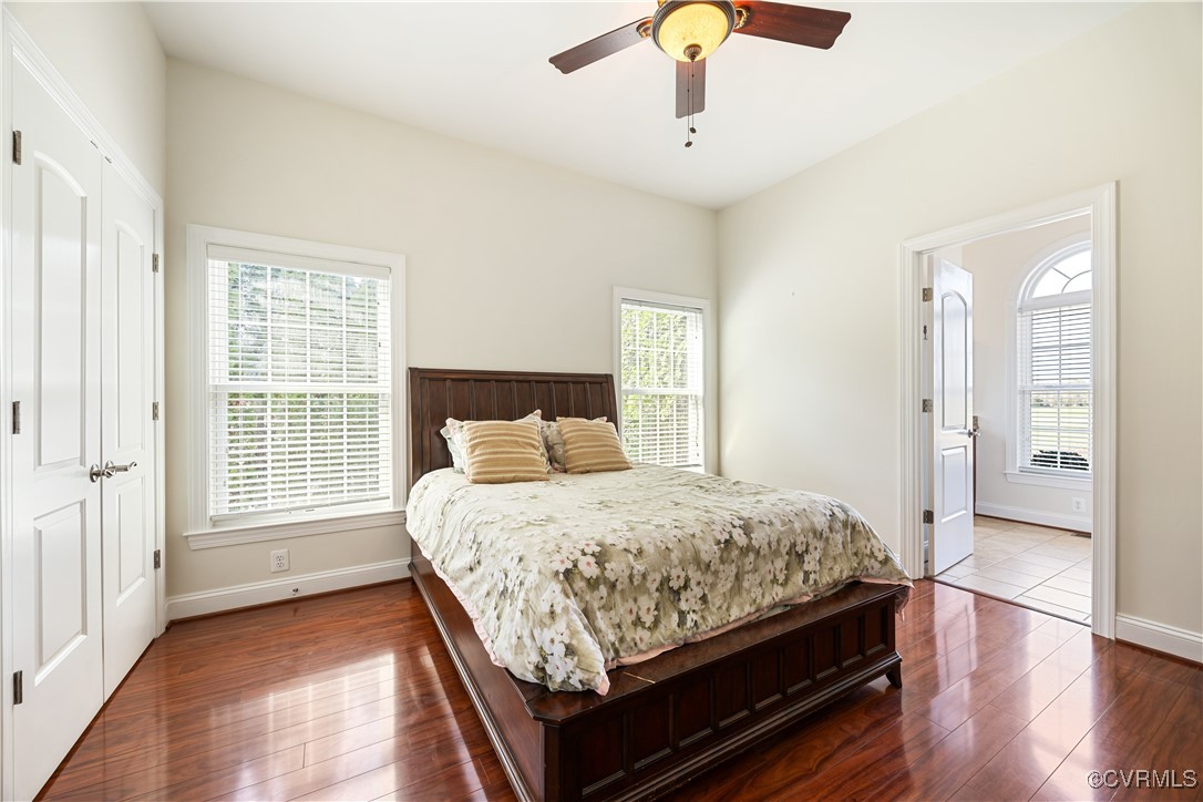 18185 Narrow Path Trail Doswell, VA 23047 - Photo 29 of 48 a bedroom with a bed and a chandelier