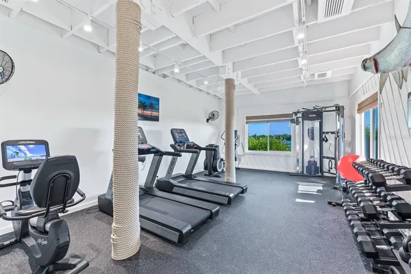 a view of a swimming pool with chairs