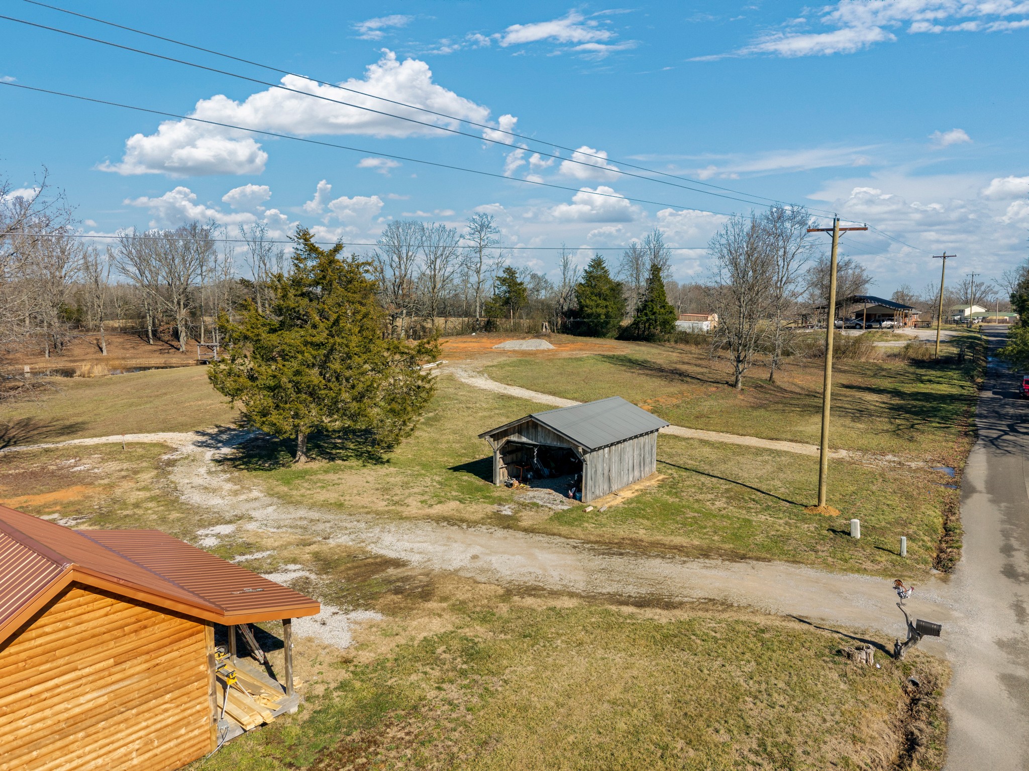 8585 Fox Hill Road Baxter, TN 38544 - Photo 8 of 29 a swimming pool with lawn chairs