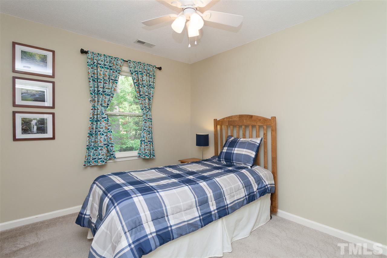 202 Trackers Road Cary, NC 27513 - Photo 13 of 24 Large closet, ceiling fan, neutral paint and carpet.