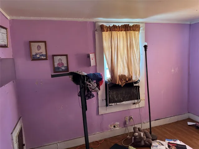 a room with furniture and a window