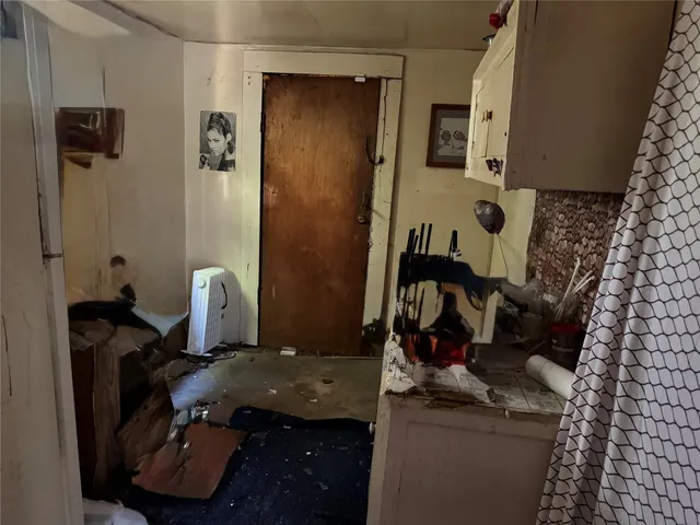 a room that has a lot of stuff and cabinets