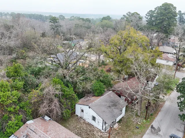an aerial view of a house with mountain view