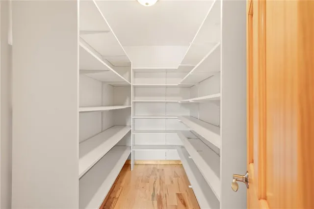 a view of a room with shelves