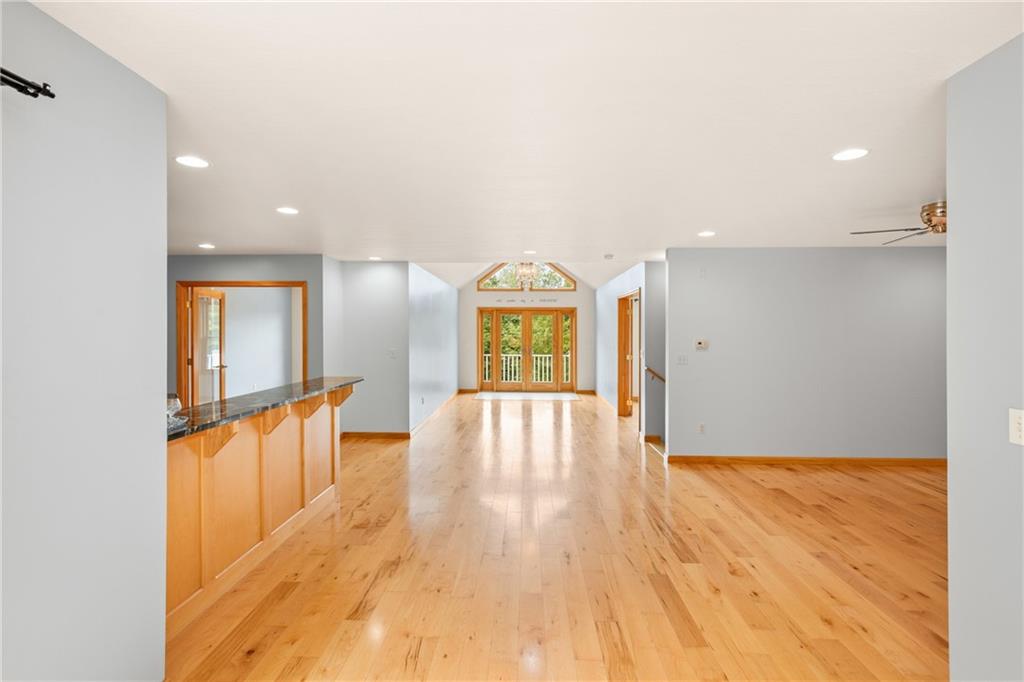 151 Old Rte 219 Salisbury, PA 15558 - Photo 7 of 45 a view of an empty room with wooden floor and a window
