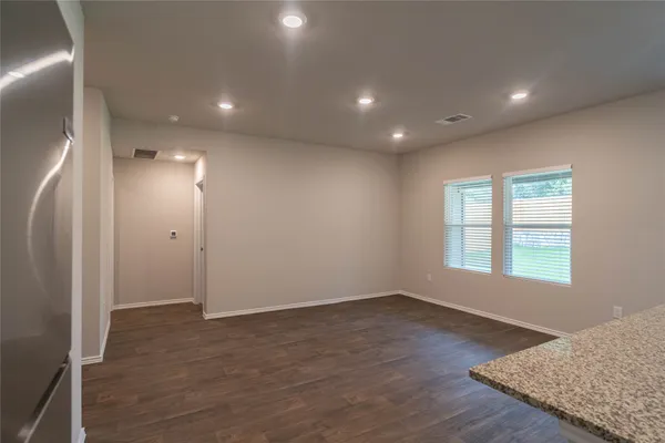 an empty room with windows