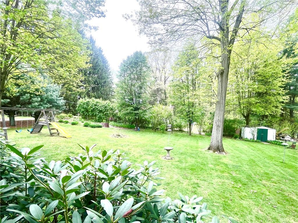 358 Crisswell Road Butler, PA 16002 - Photo 9 of 48 a view of a backyard with swimming pool