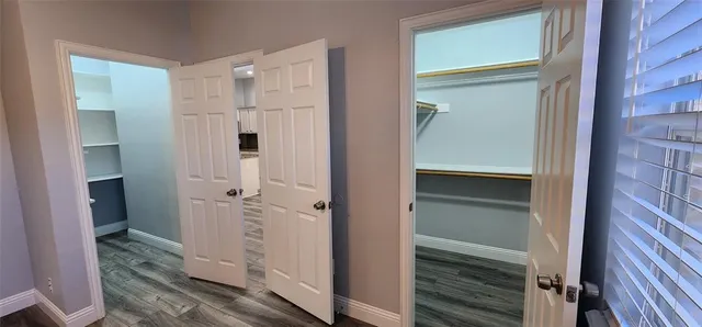 a kitchen with a sink stove and refrigerator