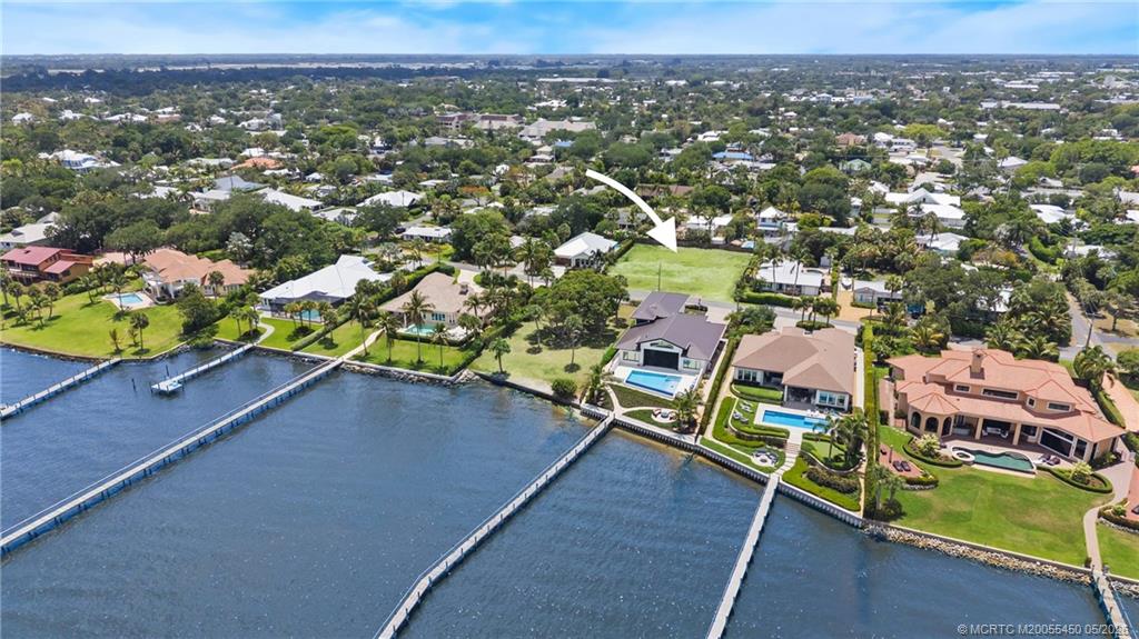 818 Southeast Riverside Drive Stuart, FL 34994 - Photo 6 of 12 an aerial view of a houses with a outdoor space