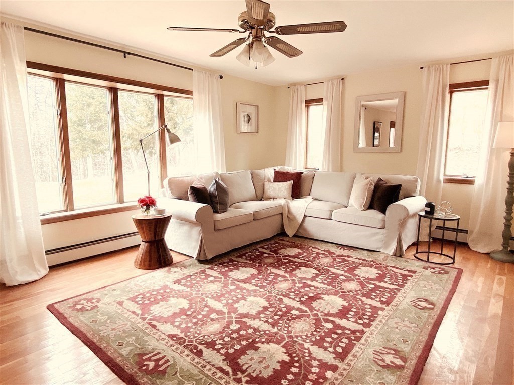 258 Old Warren Road Palmer, MA 01069 - Photo 3 of 24 a living room with furniture and a rug
