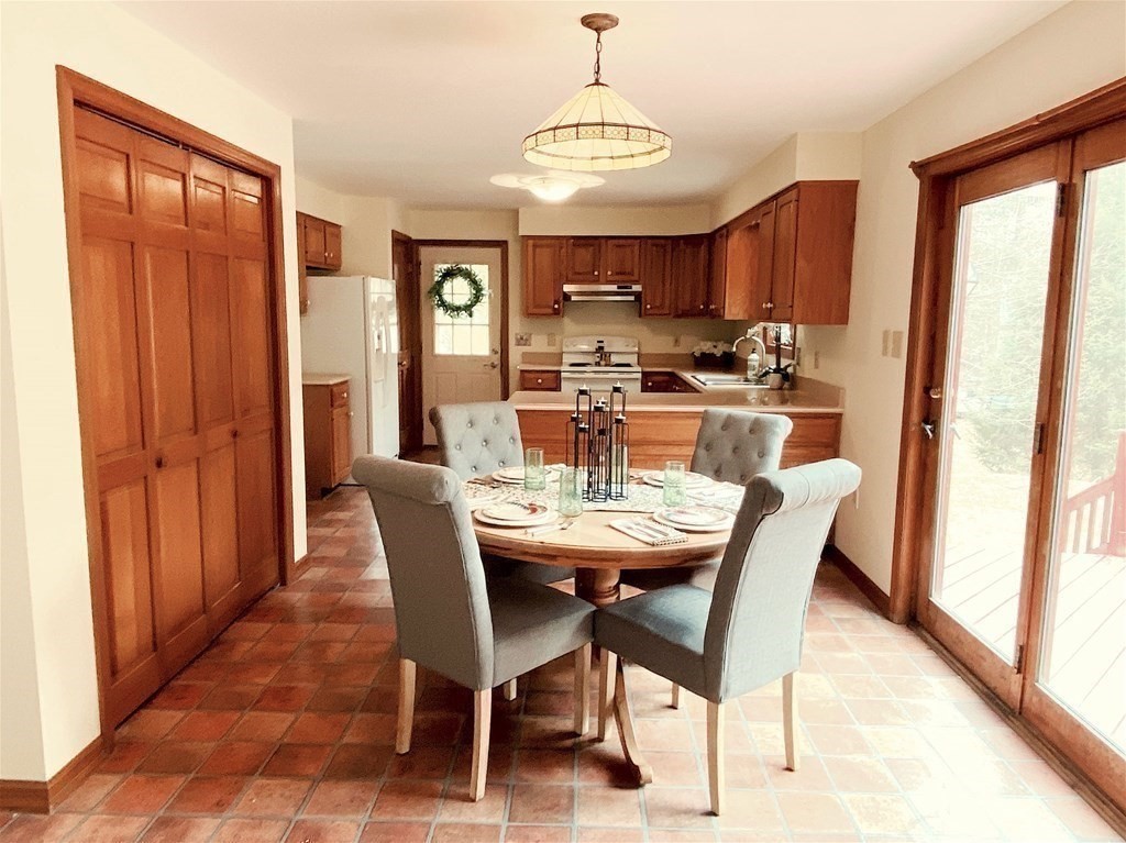 258 Old Warren Road Palmer, MA 01069 - Photo 5 of 24 a view of a dining room with furniture window and wooden floor