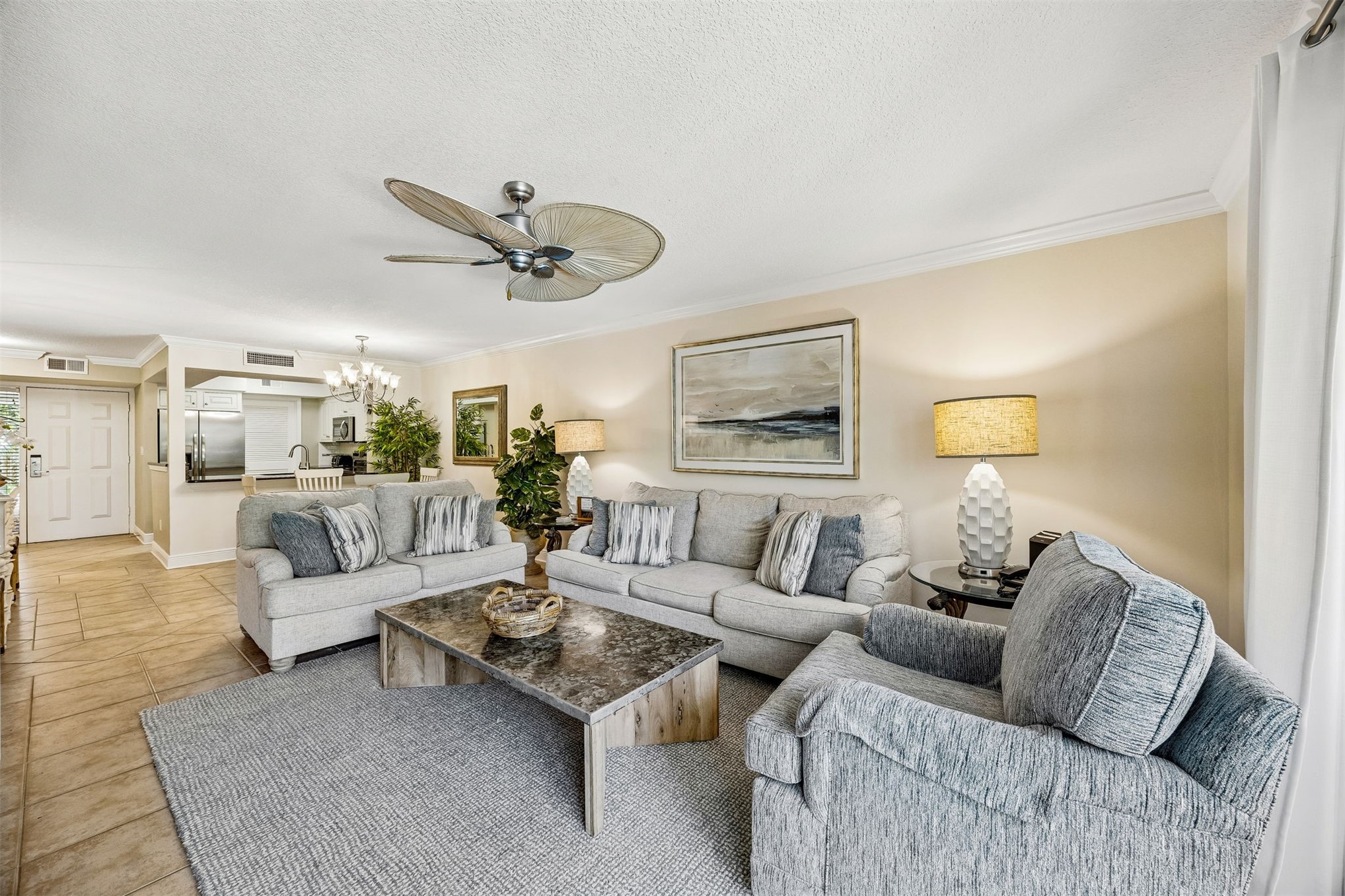 2117 Beachwood Road, Unit 2117 Fernandina Beach, FL 32034 - Photo 6 of 36 a living room with furniture a rug and a ceiling fan