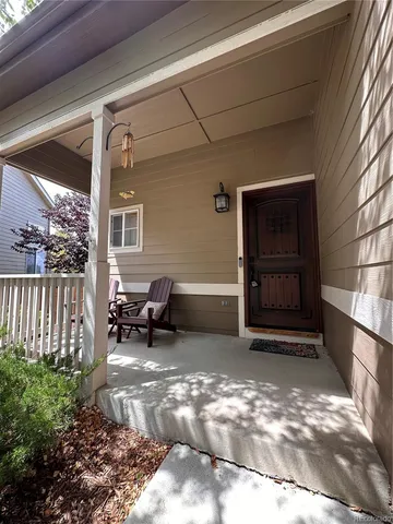 a view of a porch with a bench