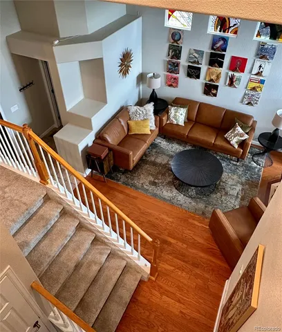 a outdoor living space with furniture and a rug
