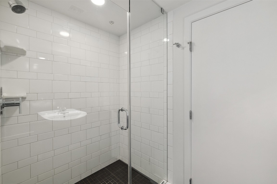 300 Bowie Street, Unit 1101 Austin, TX 78703 - Photo 23 of 40 a bathroom with a shower