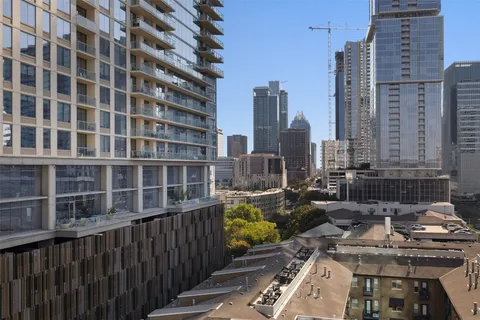 a view of a city with tall buildings