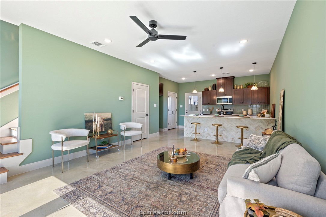106 33rd Street West Bryan, TX 77803 - Photo 8 of 22 a living room with furniture and kitchen view