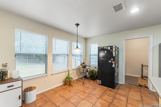 a room with furniture and a window