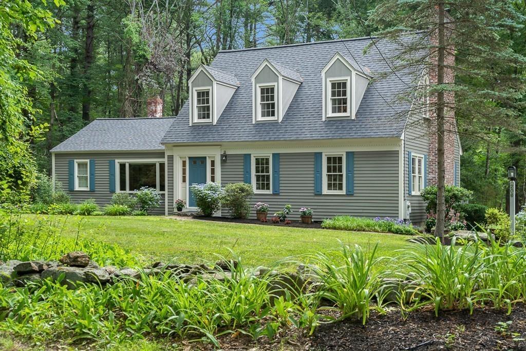 206 Prospect Street Carlisle, MA 01741 - Photo 1 of 25 a front view of a house with a yard