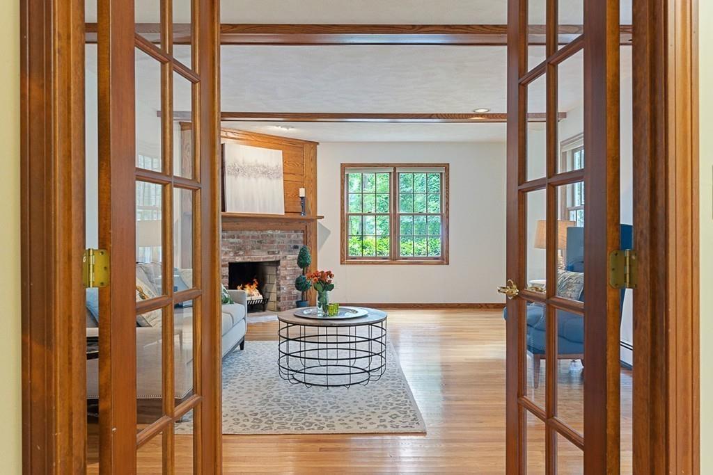 206 Prospect Street Carlisle, MA 01741 - Photo 11 of 25 a living room with furniture and a fireplace