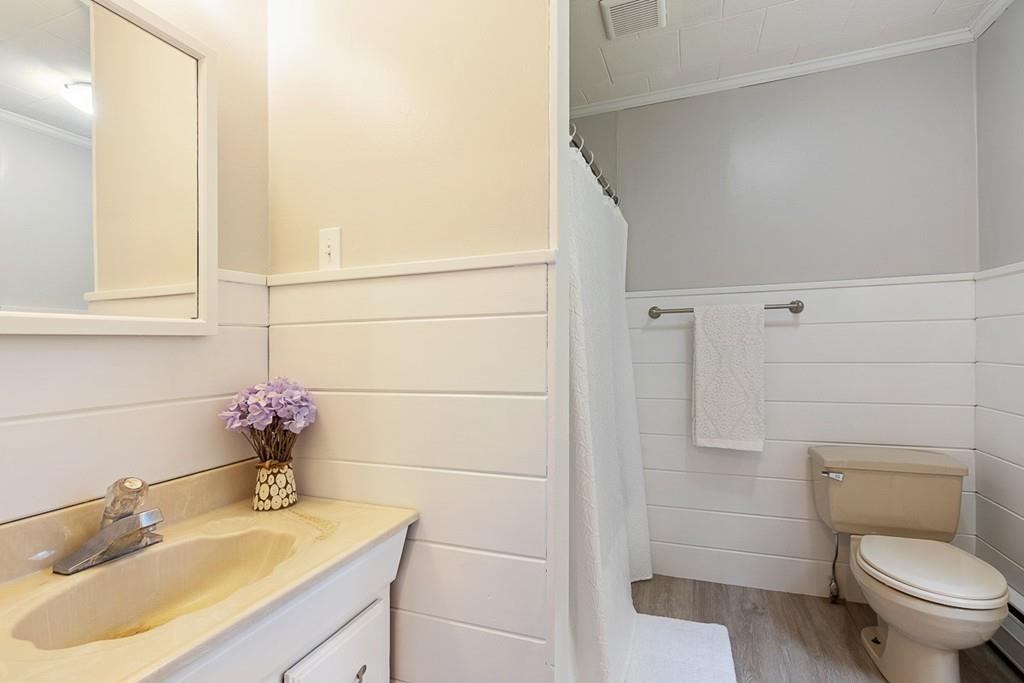 206 Prospect Street Carlisle, MA 01741 - Photo 17 of 25 a bathroom with a sink toilet and shower