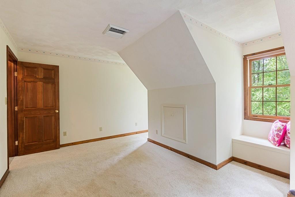 206 Prospect Street Carlisle, MA 01741 - Photo 20 of 25 a view of an empty room and a window