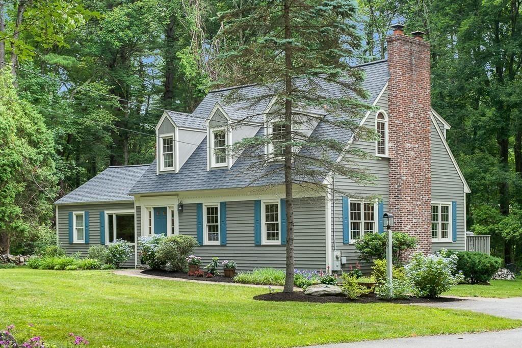 206 Prospect Street Carlisle, MA 01741 - Photo 2 of 25 a front view of a house with a yard and green space