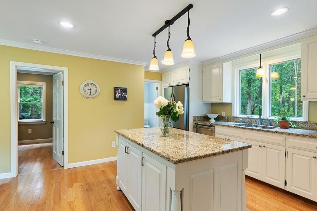 206 Prospect Street Carlisle, MA 01741 - Photo 6 of 25 a kitchen with a sink a counter top space and cabinets