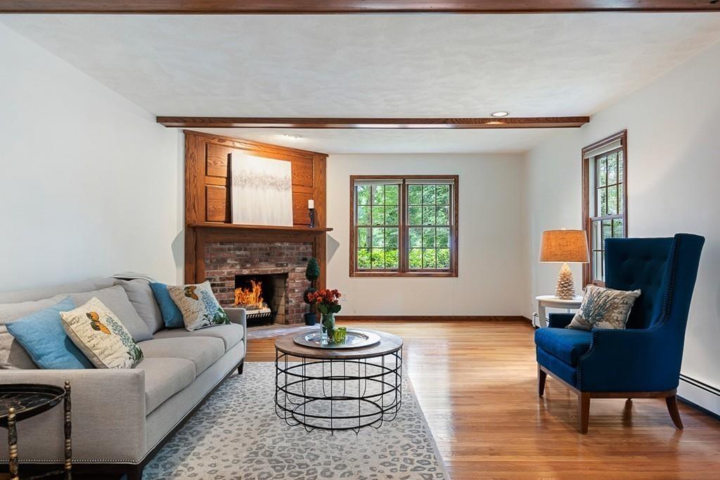 206 Prospect Street Carlisle, MA 01741 - Photo 8 of 25 a living room with furniture and a fireplace