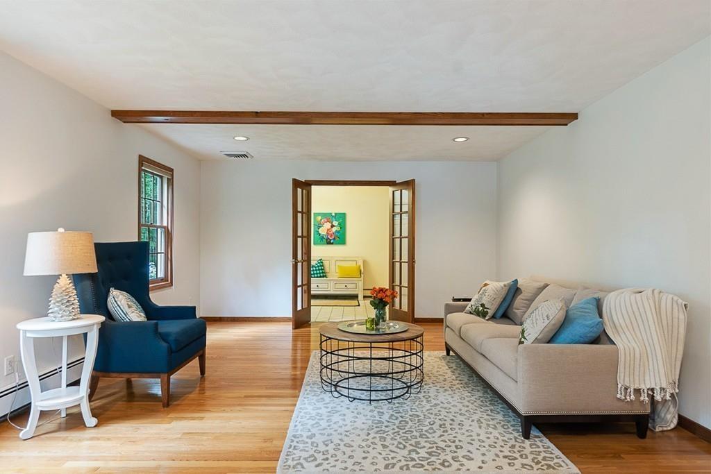 206 Prospect Street Carlisle, MA 01741 - Photo 10 of 25 a living room with furniture and a couch
